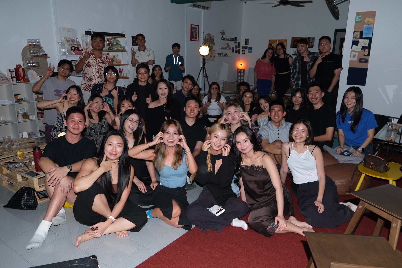 Large birthday or social group gathered inside So Bar